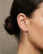 Ani stjerne piercing med flat back i sølv på øre